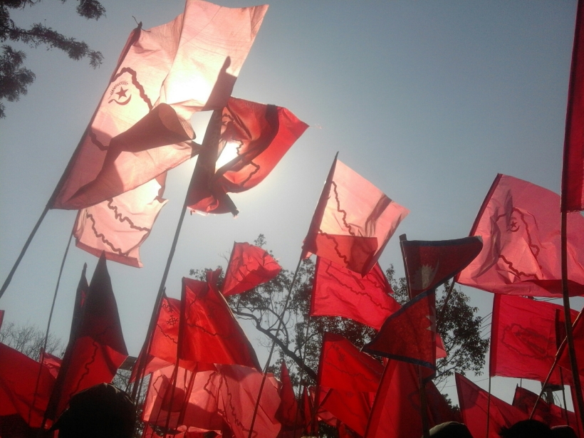 Flag:His head held high Holds the flag upright 